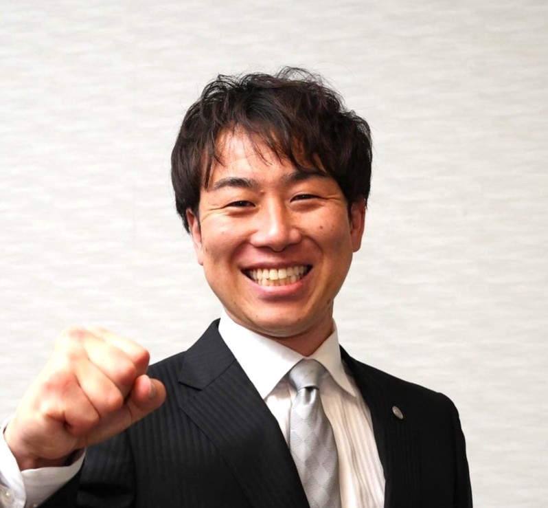 山崎 憲晴さん